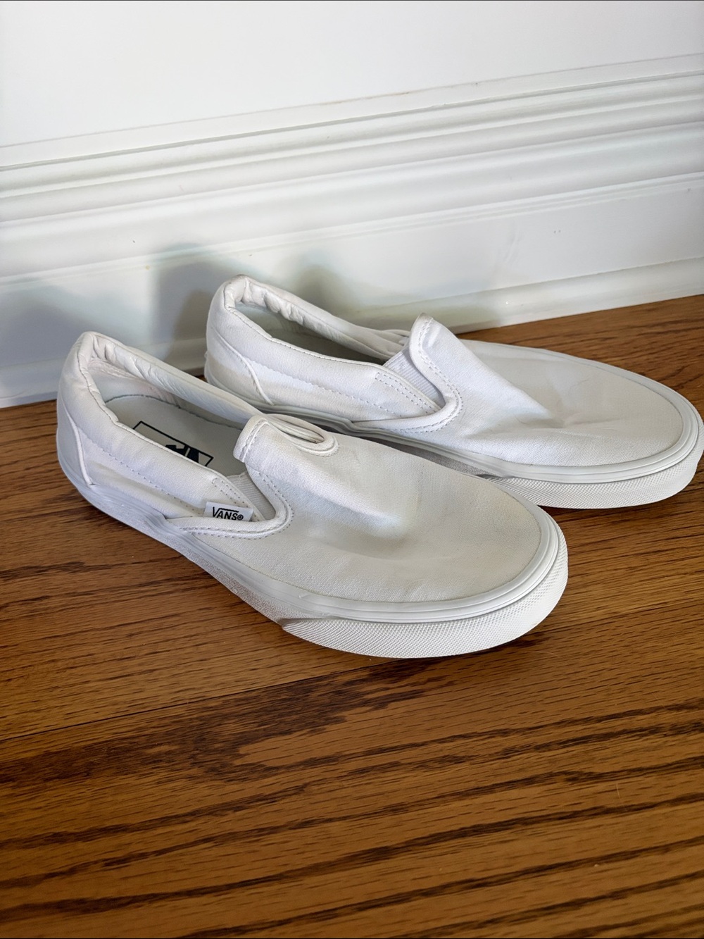 Vans White Canvas Slip-On Sneakers